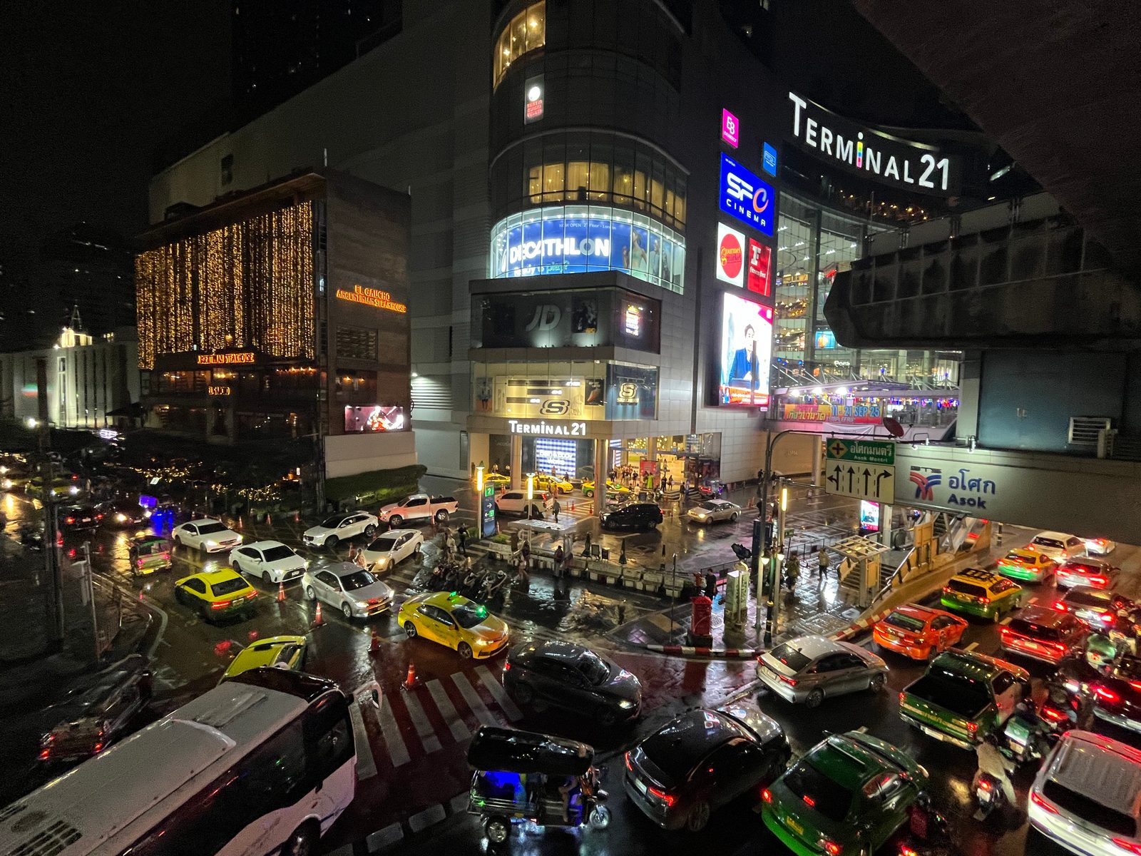 Rainy night traffic jam at the Asok junction in front of Terminal 21, Bangkok