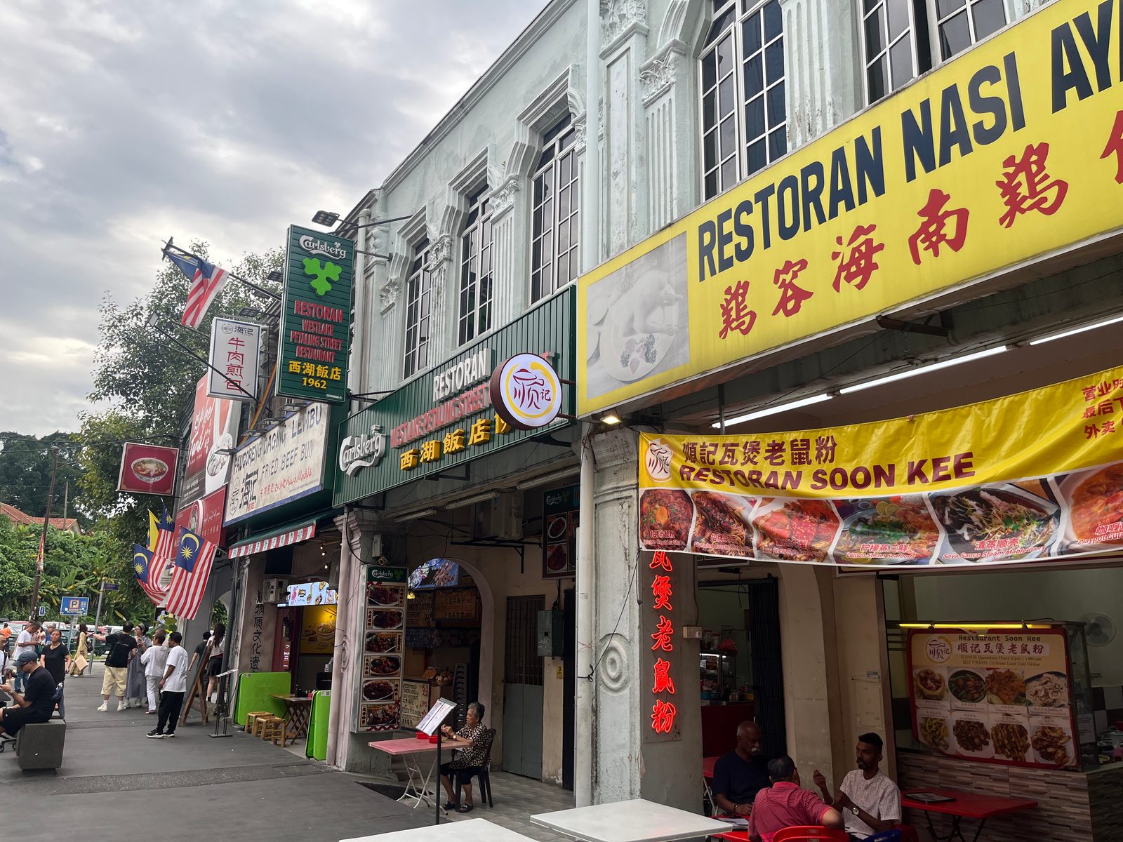 A Hainanese chicken rice restaurant in a row of restored shophouses in Kuala Lumpur