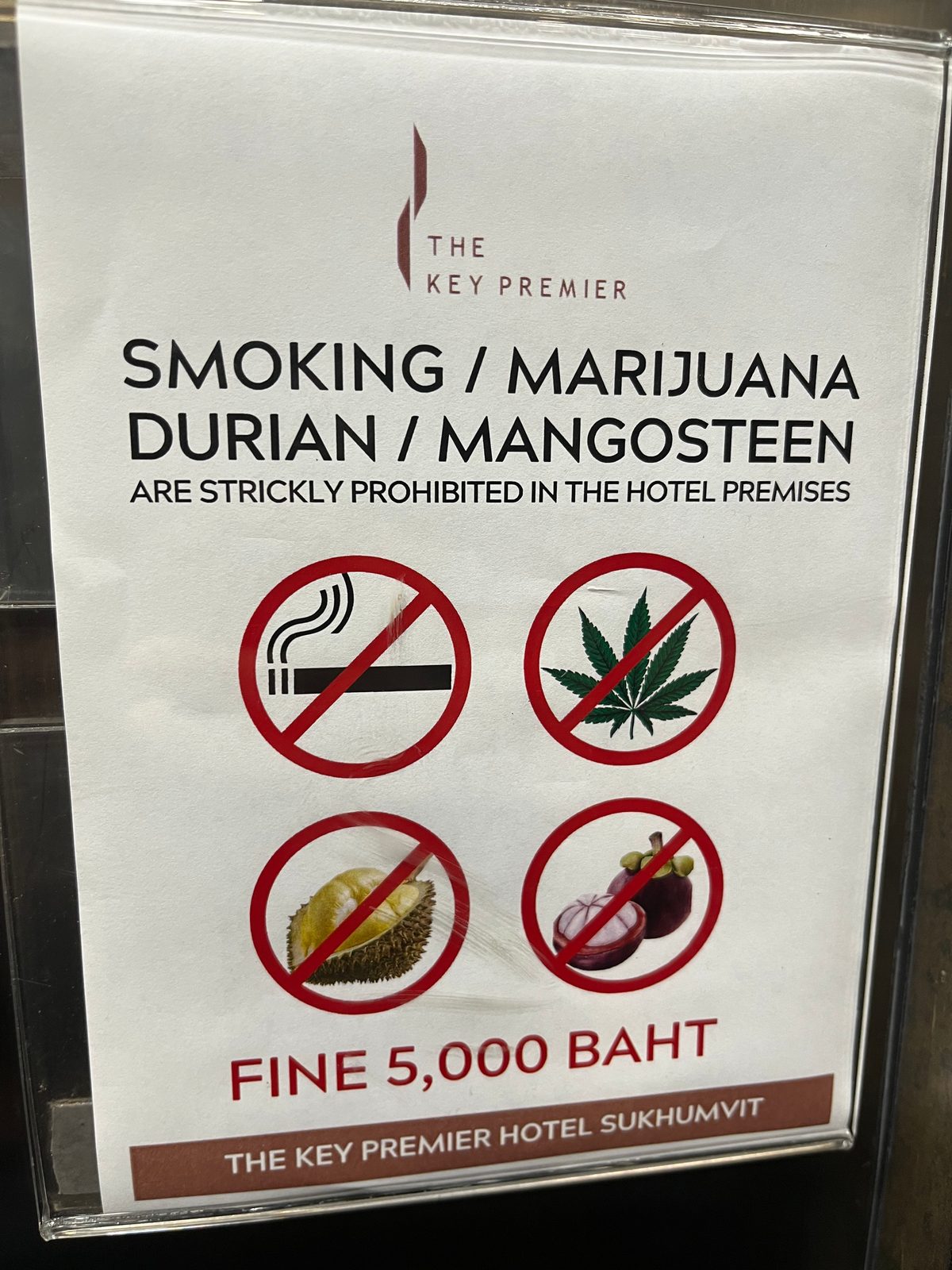 A hotel notice banning smoking, cannabis, durian and mangosteen, with a 5,000 baht fine